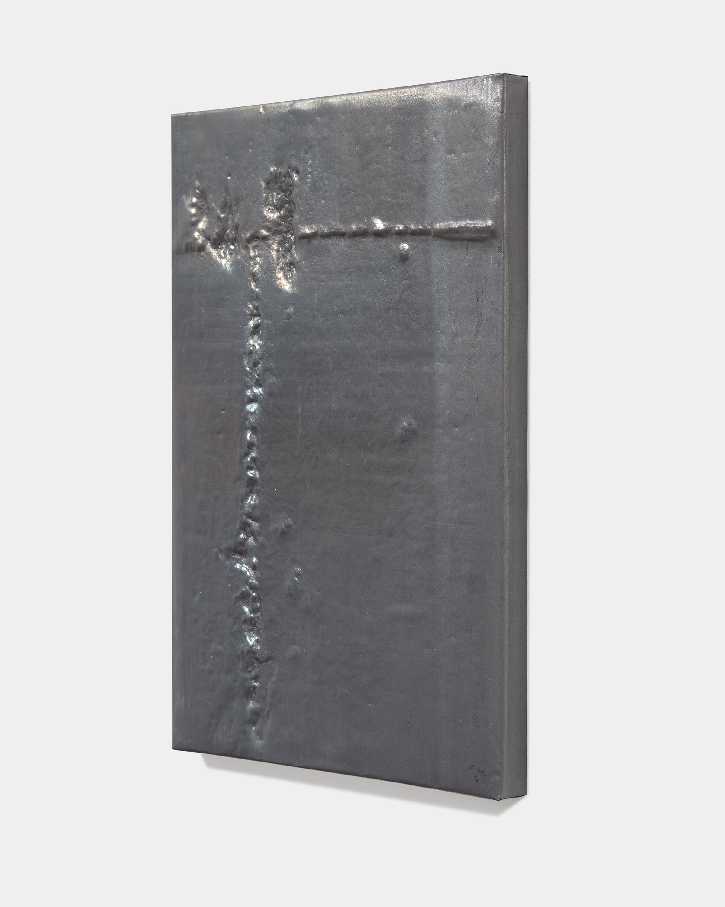a hammered lead artwork by Mitchell Charbonneau