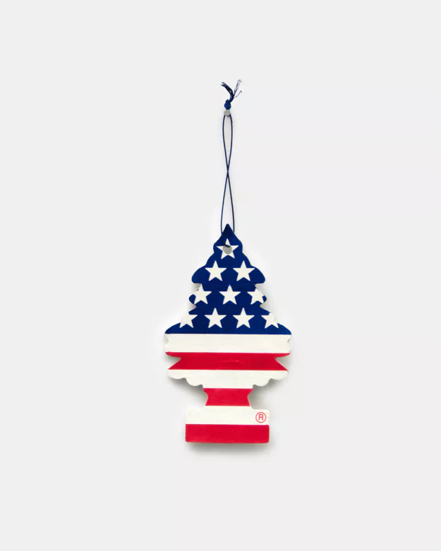 A cast bronze air freshener painted with the american flag by Mitchell Charbonneau